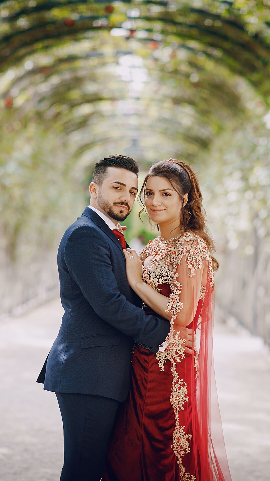 A newlywed bride and groom looking stunning in their party wear, enjoying their post-wedding celebration